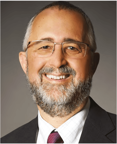 Retrato profesional del Dr. Paul Bernstein, especialista en retina y pionero en investigación sobre pigmentos maculares y nutrición ocular en la Universidad de Utah.